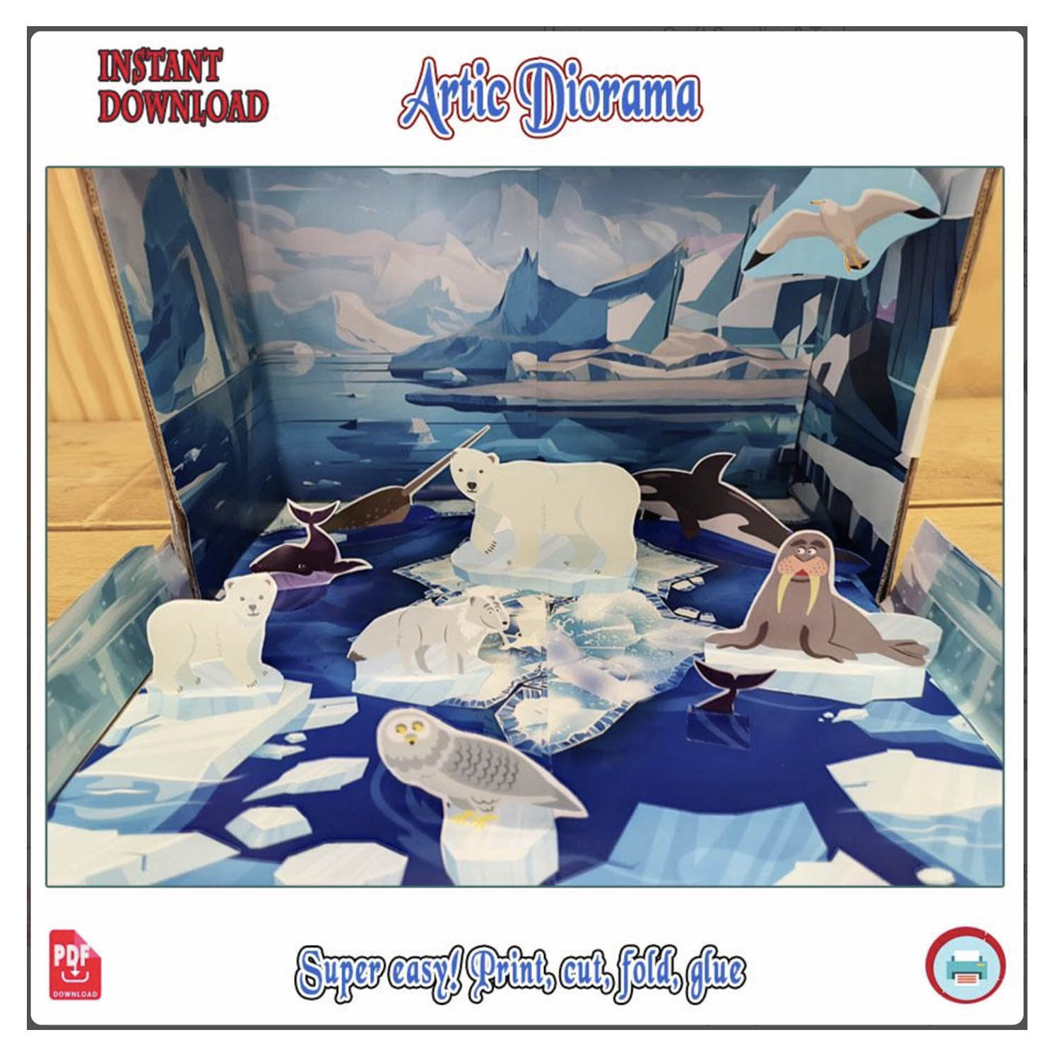 Maqueta del Polo Norte en una caja de zapatos con oso polar, foca, morsa y hielo